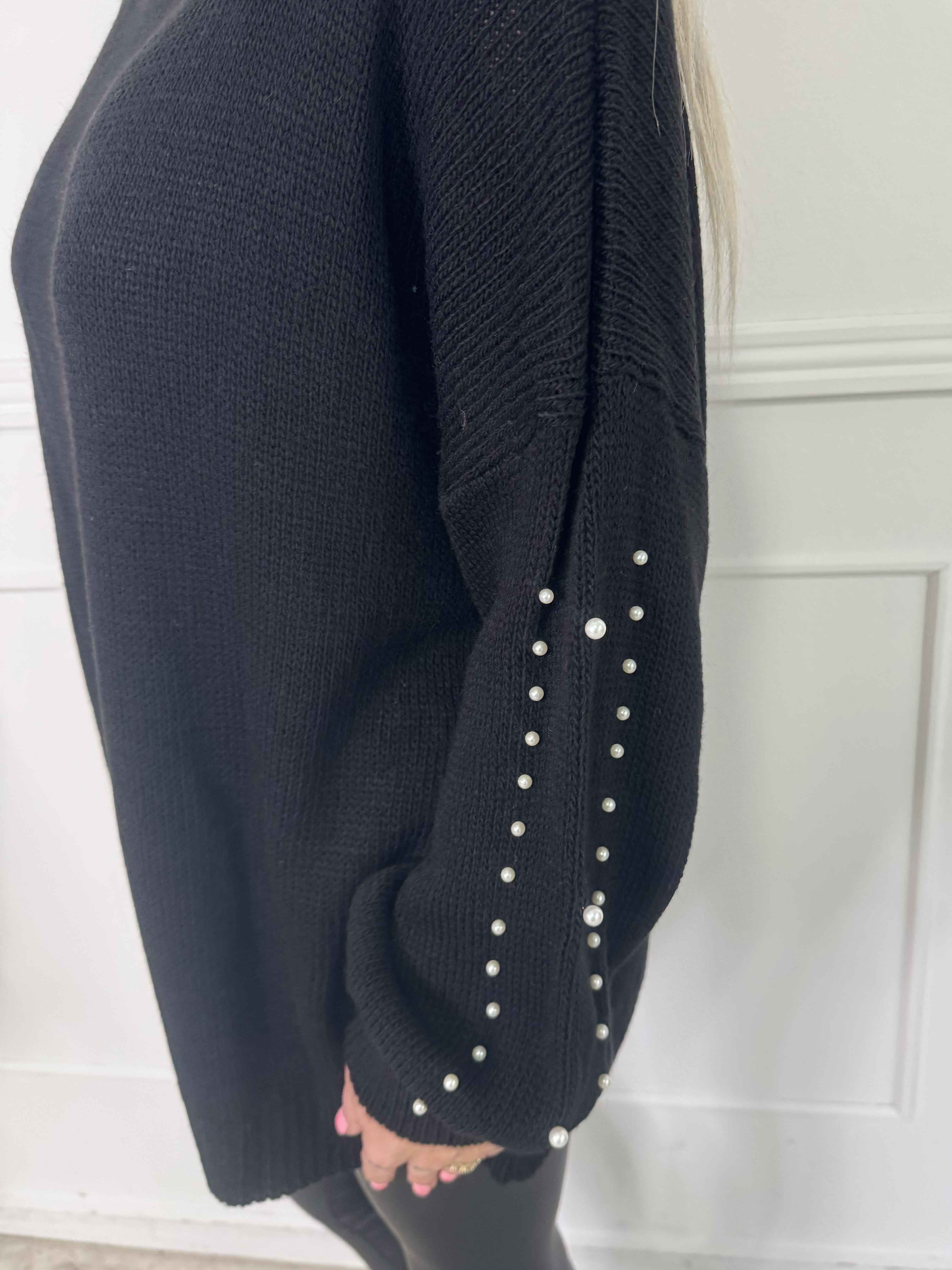 Viviane - Strik detaljeret med hvide perler og ballonærmer